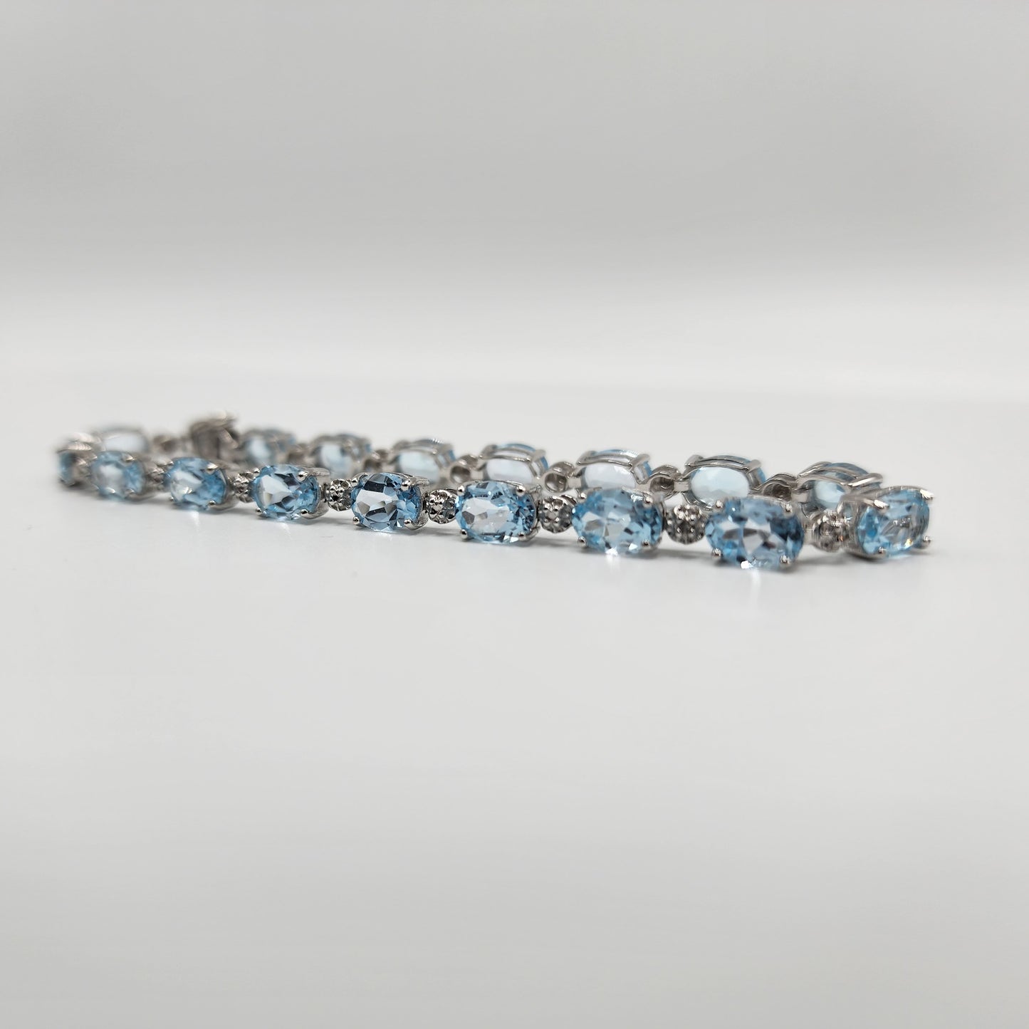 10k White Gold Topaz and Diamond Accent Bracelet