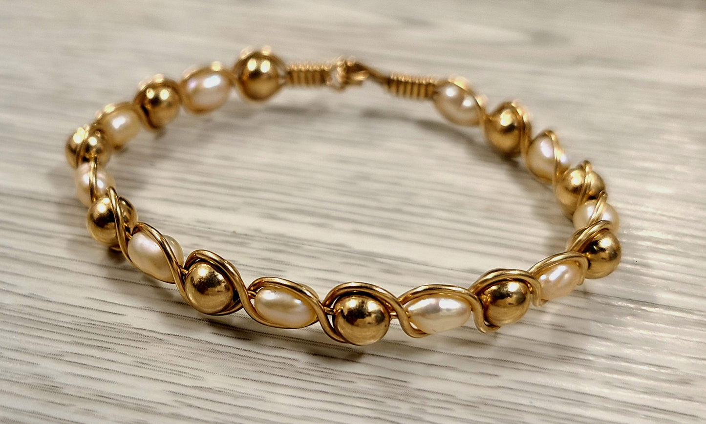 14k Yellow Gold and pearl Bangle Bracelet ( comes with appraisal)
