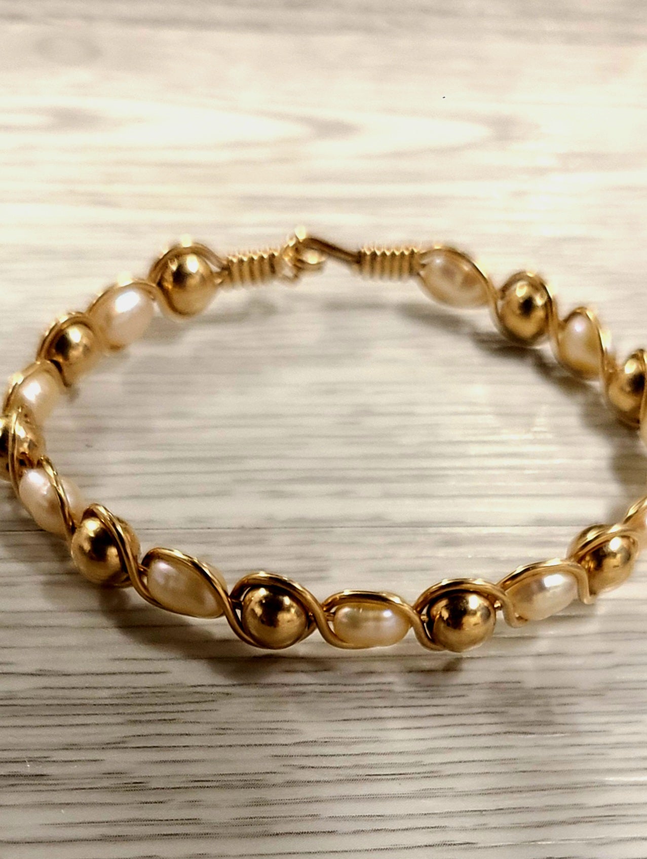 14k Yellow Gold and pearl Bangle Bracelet ( comes with appraisal)