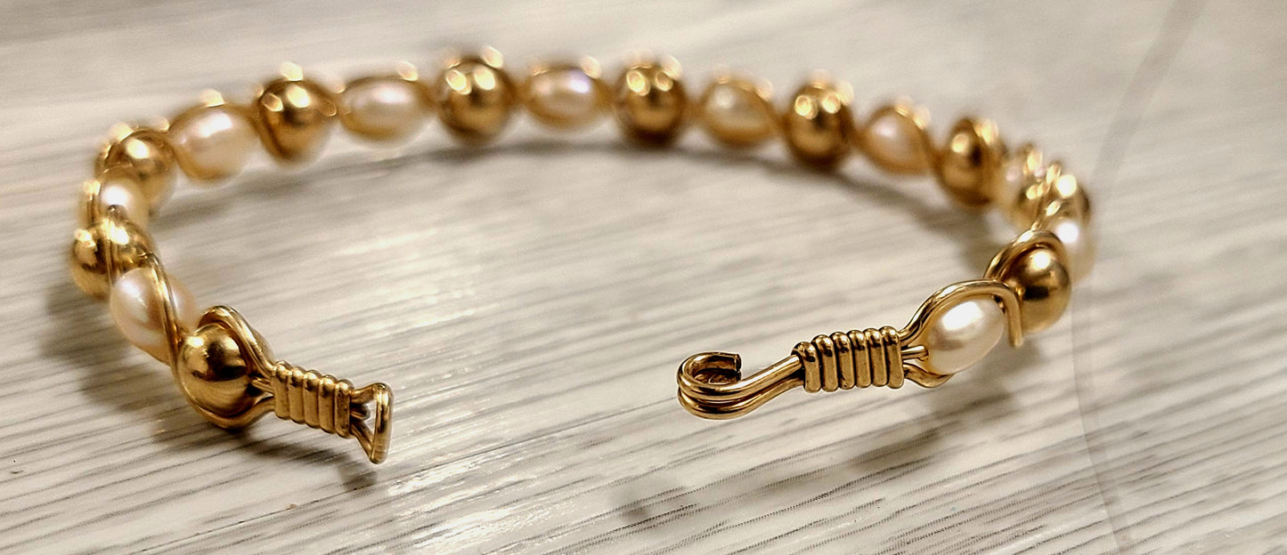 14k Yellow Gold and pearl Bangle Bracelet ( comes with appraisal)
