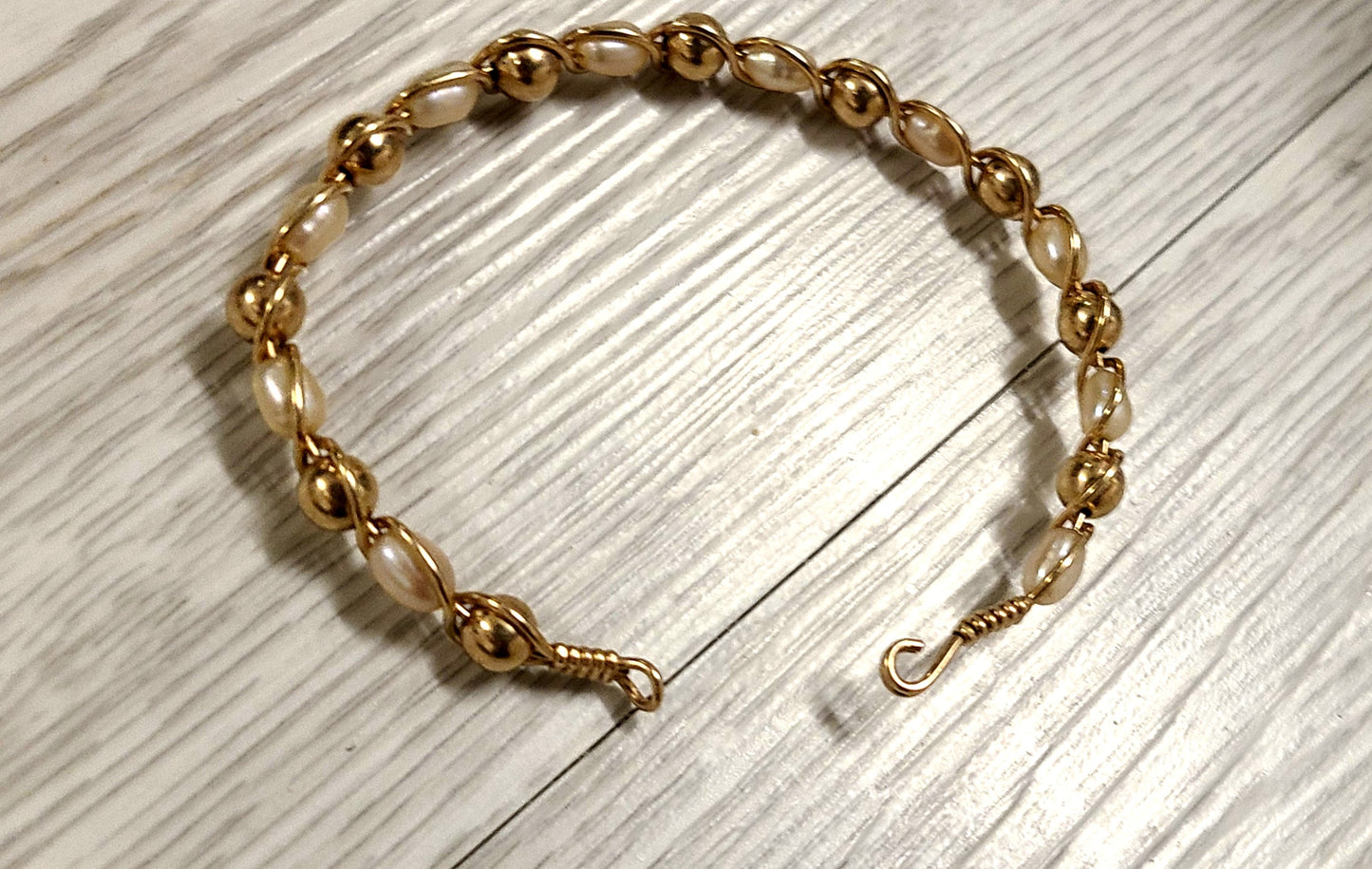 14k Yellow Gold and pearl Bangle Bracelet ( comes with appraisal)