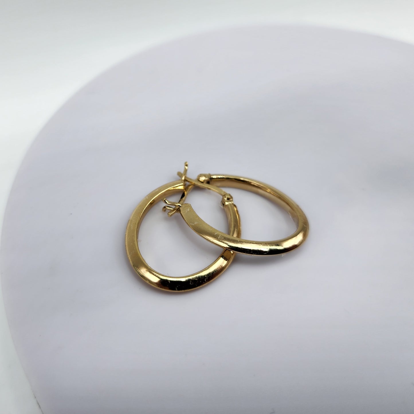 Gold over Sterling Silver Oval Hoop Earrings