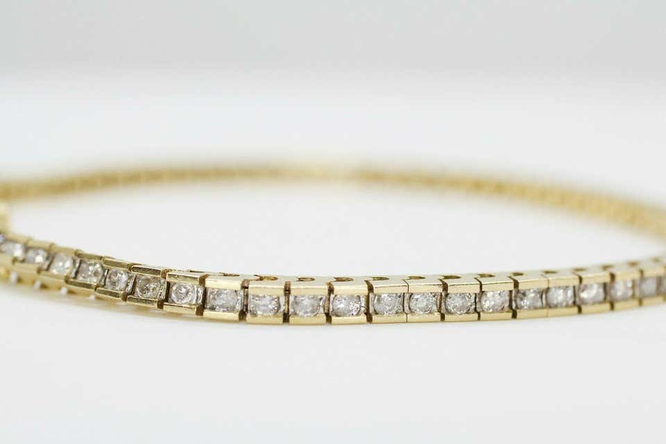 14K Yellow Gold Bracelet with channel Set Diamonds