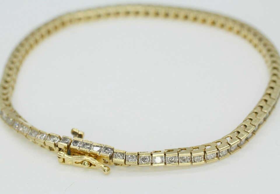 14K Yellow Gold Bracelet with channel Set Diamonds